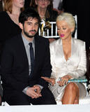 Christina Aguilera in white body-hugging dress arrives at Christian Dior Cruise 2009 Collection